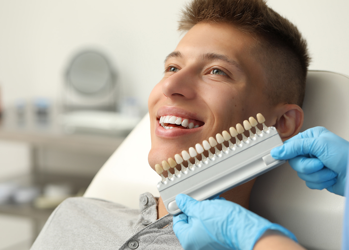 Porcelain veneers enhancing tooth shape, color, and smile symmetry