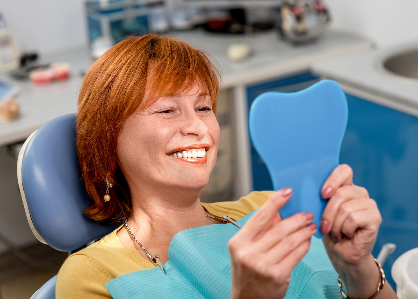 Information on the longevity of Teeth-In-A-Day results, noting that implants can last a lifetime and prostheses last 10-20 years